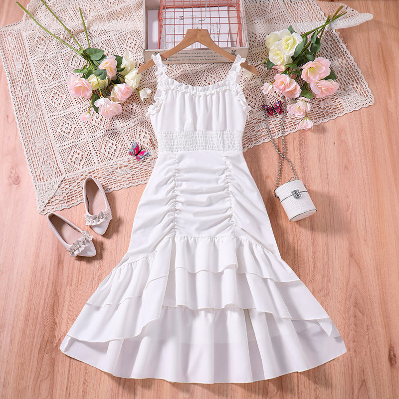 Vestido blanco engomado y cola de sirena escalonado