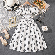 Carregar imagem no visualizador da galeria, Vestido blanco con estampas y detalles en la cintura
