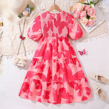 Cargar imagen en el visor de la galería, Vestido rosa engomado con estampas y mangas abullonadas
