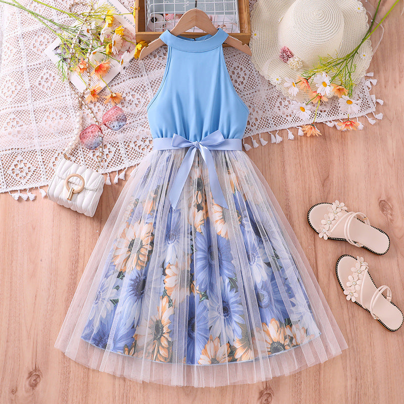 Vestido celeste cuello alto, falda floreado con tul