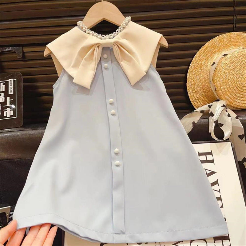 Vestido celeste con volados crema y perlas