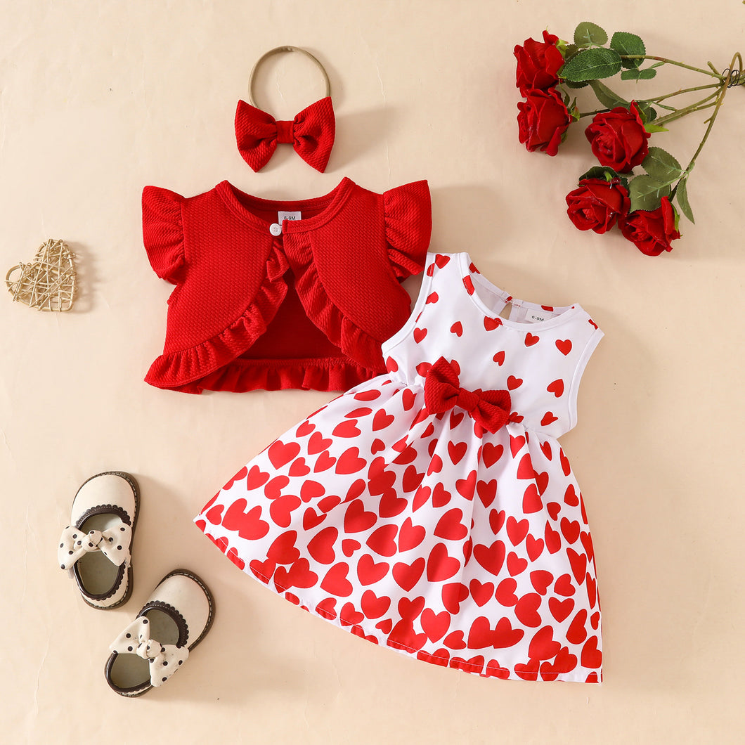 Vestido con estampas de corazones y bolero rojo con vincha