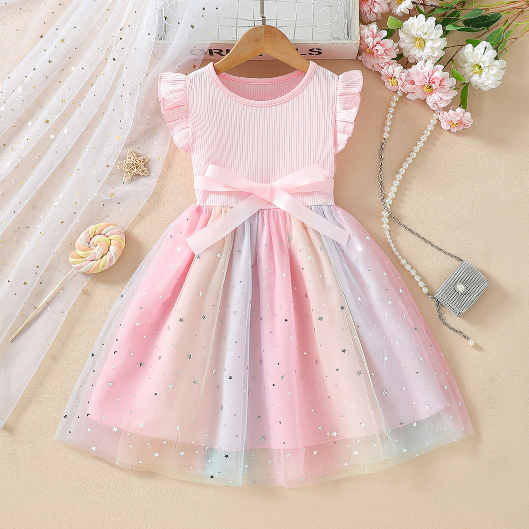 Vestido rosa con tul colorido, brillo y moño