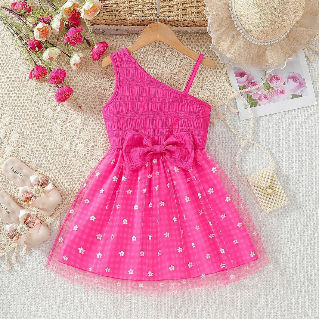 Vestido un solo hombro con moño y falda de tul