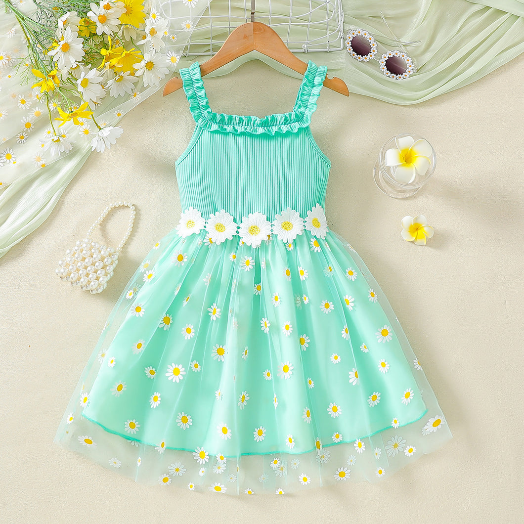 Vestido verde agua con falda de tul y estampas de margaritas