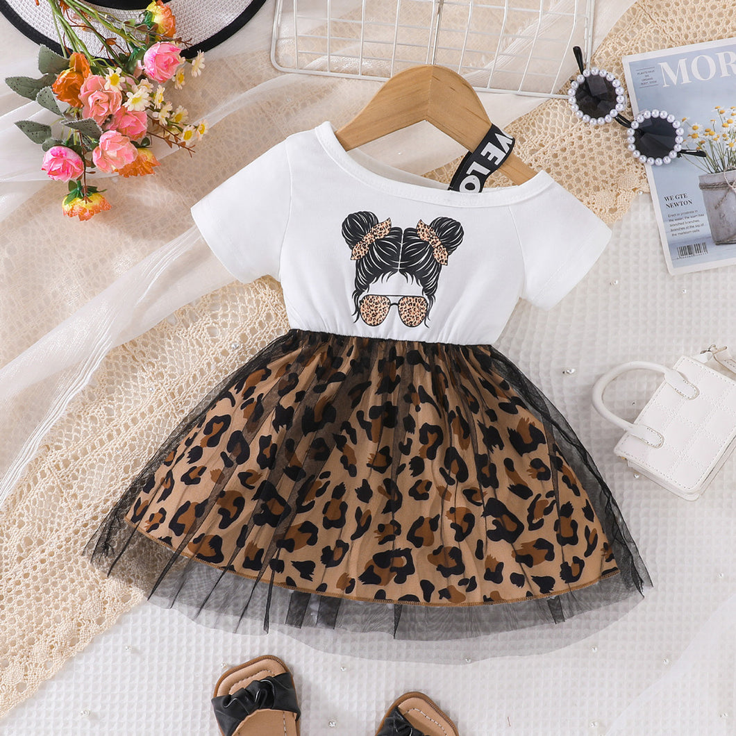 Vestido blanco, un solo hombro con estampa y tul de animal print