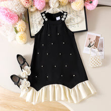 Carregar imagem no visualizador da galeria, Vestido negro con perlas y volados en crema
