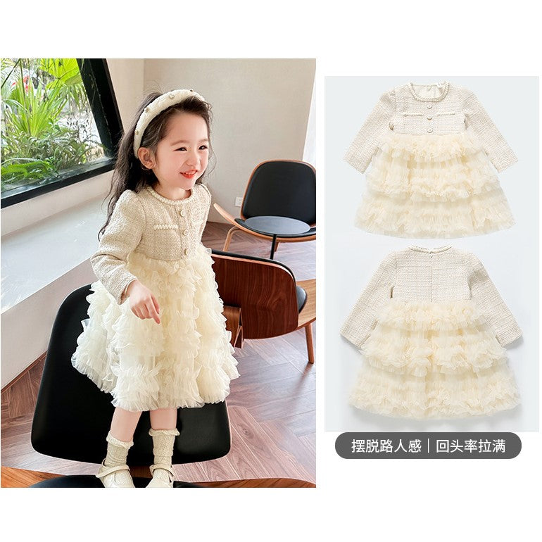 Vestido crema de hilo con falda de tul escalonado