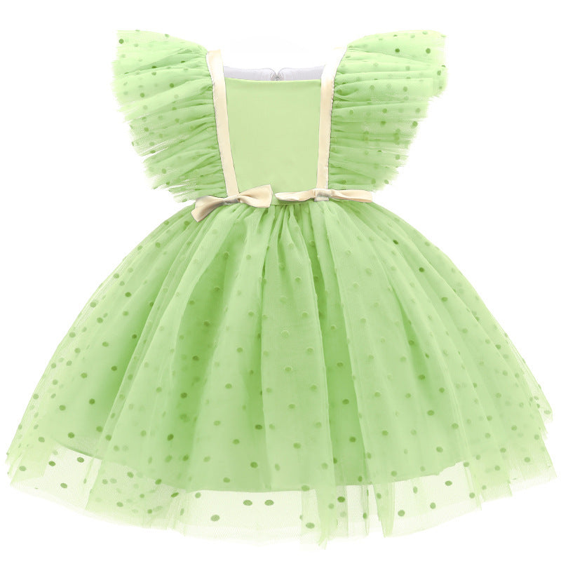 Vestido con mangas de tul, moño y detalles en dorado con moño