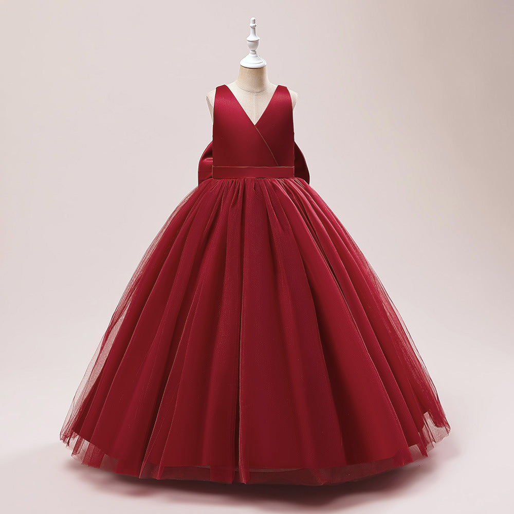 Vestido largo con falda de tul y moño grande