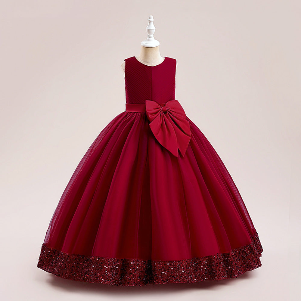 Vestido largo con moño y lentejuelas