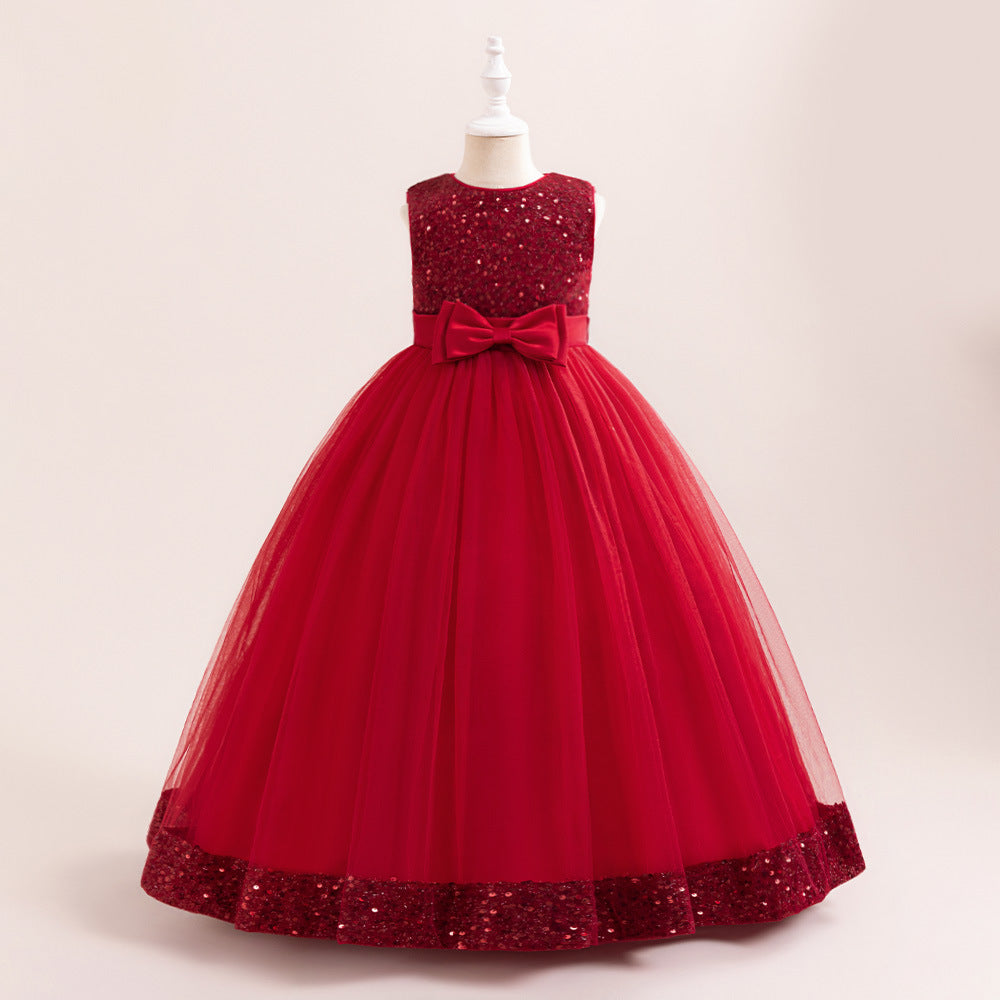 Vestido largo con lentejuelas y moño