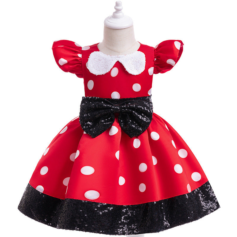 Vestido rojo, motas blancas, moño negro estilo de Minnie Mouse con vincha