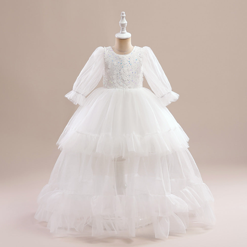 Vestido media manga blanco,  largo de tul escalonado con bordados