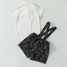 Cargar imagen en el visor de la galería, Body blanco con moño, short negro con tirante y estampa de leche
