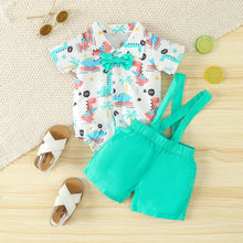 Cargar imagen en el visor de la galería, Body blanco con estampas de dino, short con tirante y moño verde agua
