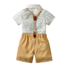 Carregar imagem no visualizador da galeria, Body camisa blanco con estampas, moño y short beige con tirante
