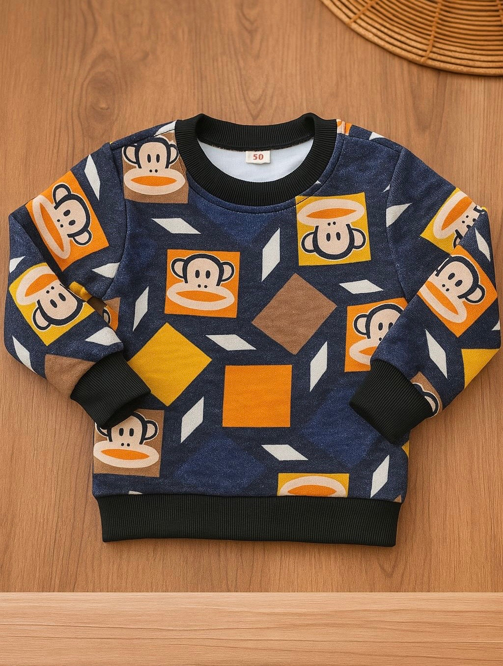 Abrigo de hilo con forro y estampas de mono