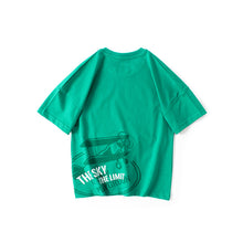 Cargar imagen en el visor de la galería, Remera liso con estampa de avión en la espalda
