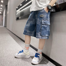 Carregar imagem no visualizador da galeria, Short jeans cuadrille tipo camuflado con bolsillos en los costados
