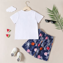 Cargar imagen en el visor de la galería, Remera blanca y short azul marino con estampas de flores
