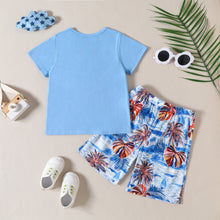 Carregar imagem no visualizador da galeria, Remera celeste y short con estampas de palmeras
