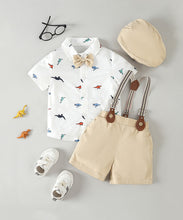 Cargar imagen en el visor de la galería, Camisa blanca con estampas de dino, moño,boina y short con tirante crema
