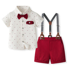 Cargar imagen en el visor de la galería, Camisa blanca con estampas, moño y short bordo con tirante
