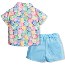 Carregar imagem no visualizador da galeria, Camisa con estampas de huevo de pascua, moño y short celeste
