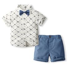 Cargar imagen en el visor de la galería, Camisa blanco con estampas de aviones con short y moño azul
