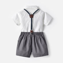 Carregar imagem no visualizador da galeria, Camisa blanco con short, moño gris oscuro y tirante azul marino
