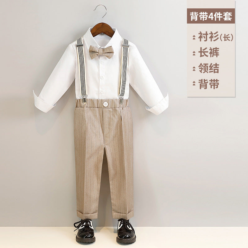 Camisa blanca con moño y pantalón beige a rayas con tirante