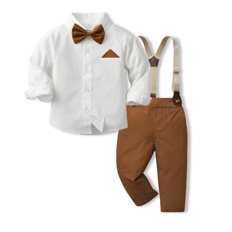 Camisa blanca con moño y pantalón marrón con tirante