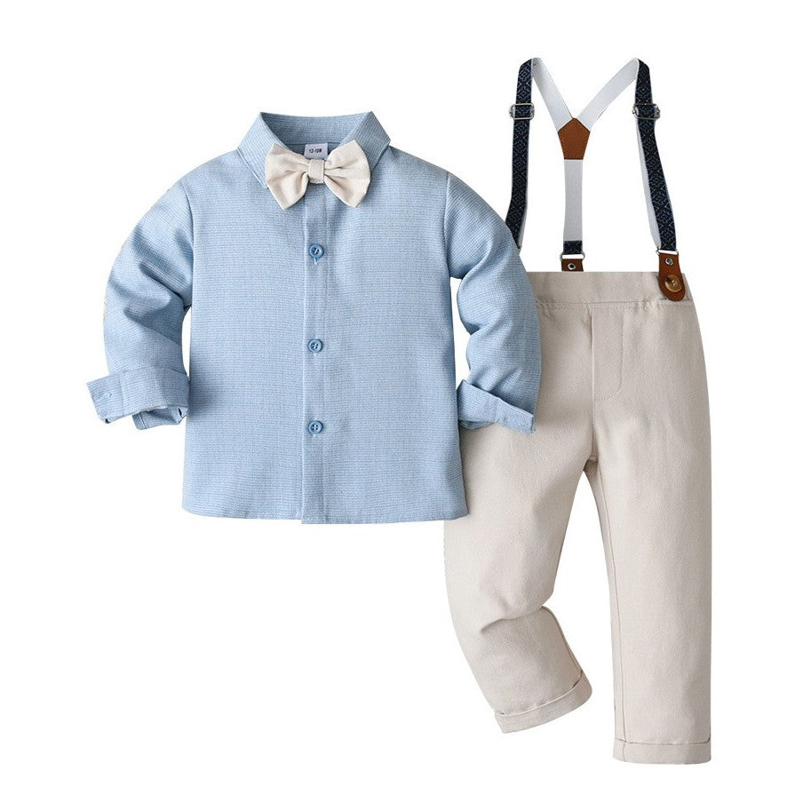 Camisa celeste con moño y pantalón crema con tirante