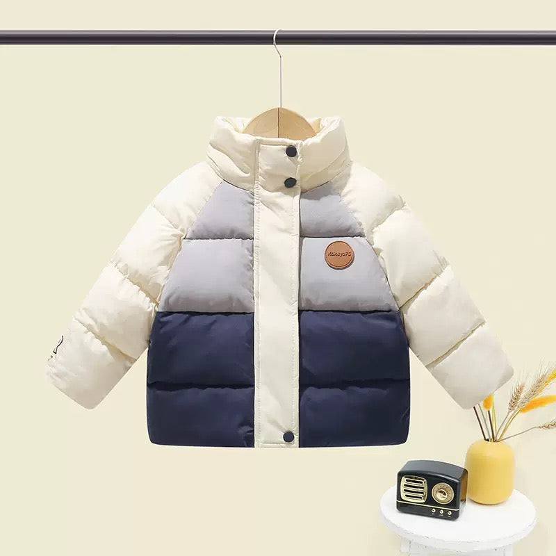 Campera de pluma rompe viento