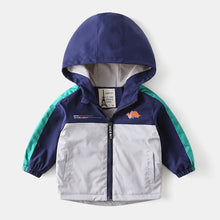 Carregar imagem no visualizador da galeria, Campera rompeviento micro polar gris con mangas verde y capucha de dino
