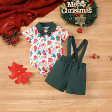 Cargar imagen en el visor de la galería, Body blanco con estampas navideñas, short con tirante y moño verde
