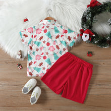 Carregar imagem no visualizador da galeria, Camisa blanca con estampas navideñas y short con moño rojo
