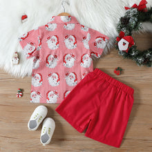 Cargar imagen en el visor de la galería, Camisa blanca a rayas con estampas de Papá Noel y short con moño rojo
