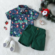 Cargar imagen en el visor de la galería, Camisa turquesa con estampas navideñas y short con moño verde
