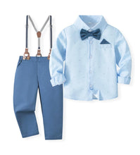 Carregar imagem no visualizador da galeria, Camisa celeste con estampas, moño y pantalón azul con tirante
