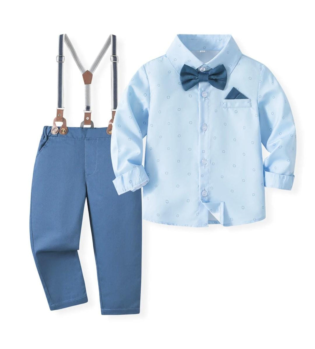 Camisa celeste con estampas, moño y pantalón azul con tirante
