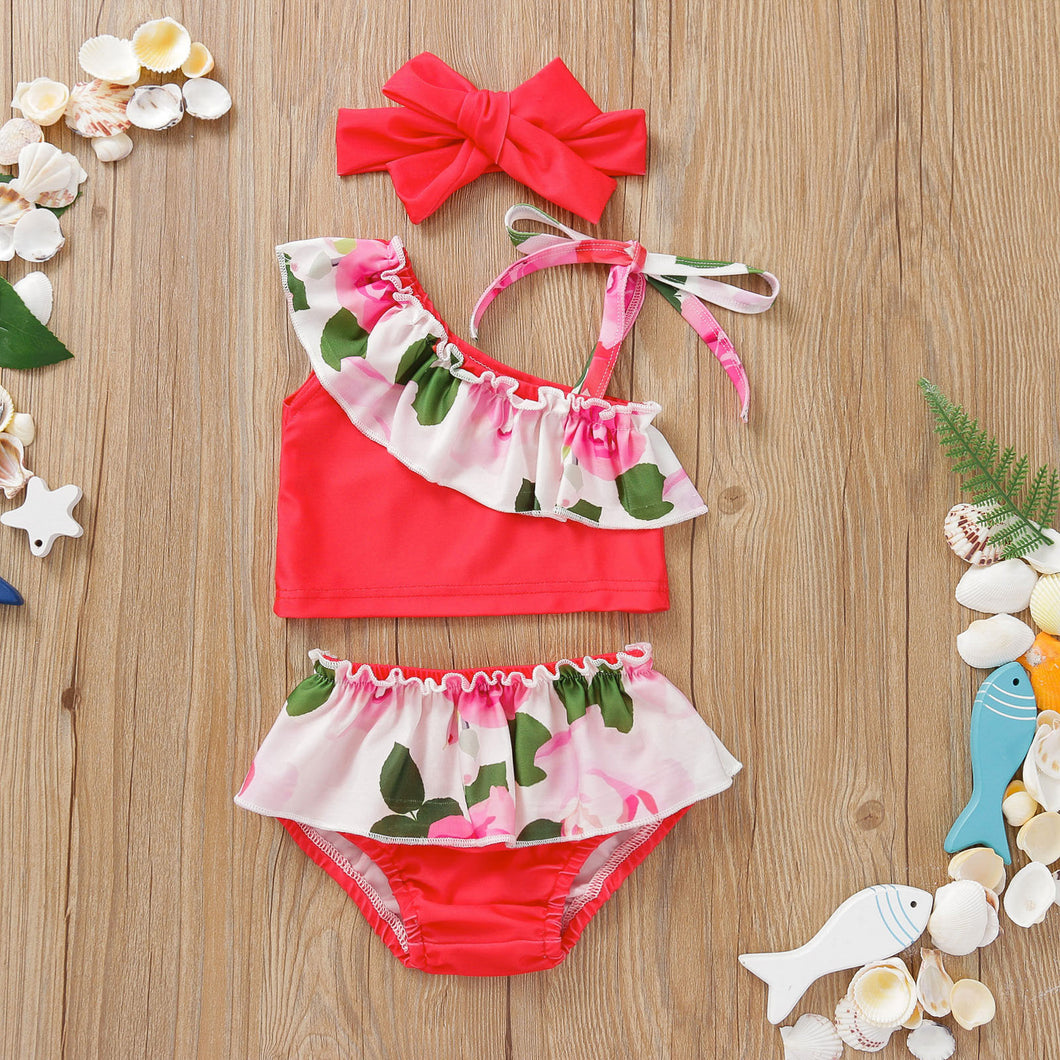 Traje de baño rojo con volados de flores y vincha