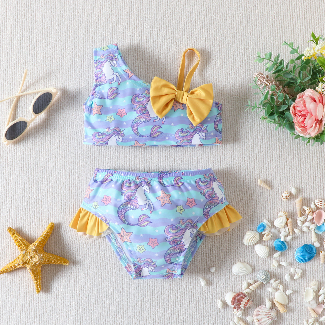 Traje de baño celeste con estampas de sirena-unicornio y moño amarillo