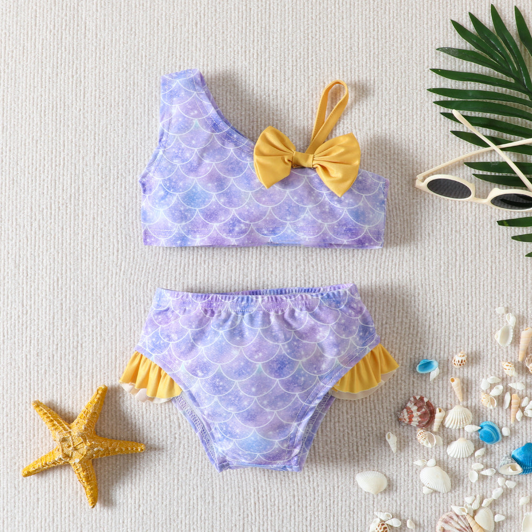 Traje de baño lila con escamas de sirena y moño amarillo