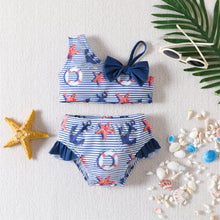 Carregar imagem no visualizador da galeria, Traje de baño a rayas con estampas de anclas y estrella del mar con moño azul marino
