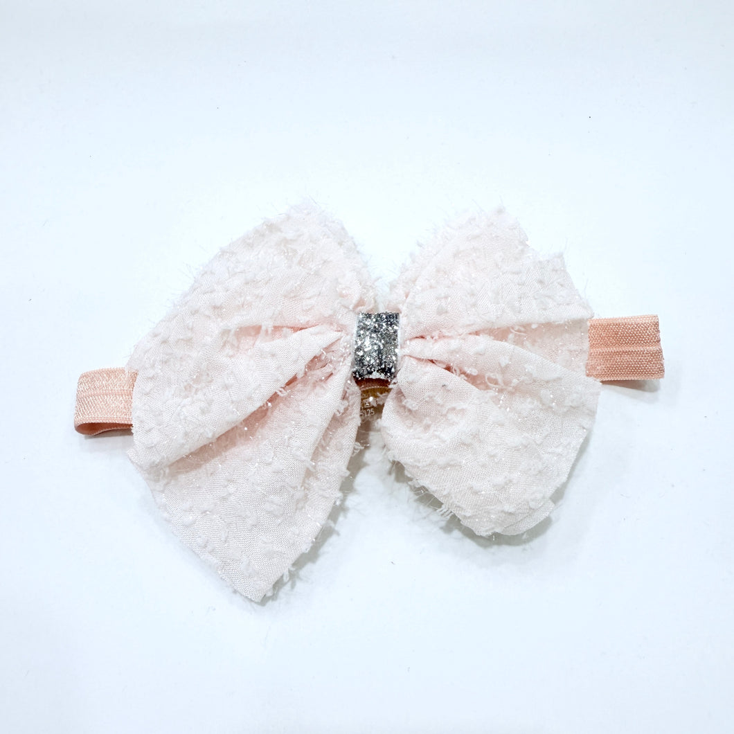 Vincha de moño con relieve y brillo