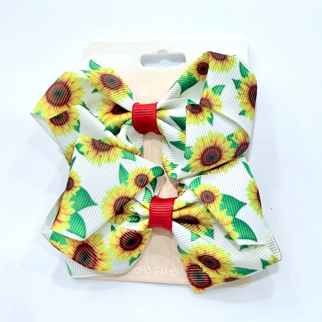 Hebillas de moños blanco con estampas de girasoles