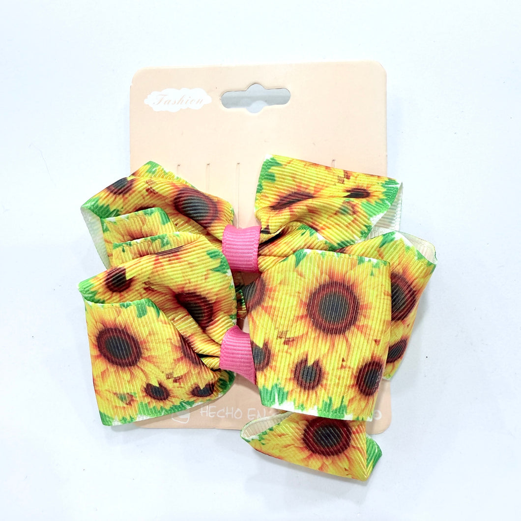 Hebillas de moños con estampas de girasoles