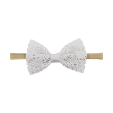 Carregar imagem no visualizador da galeria, Vincha con moño de encaje
